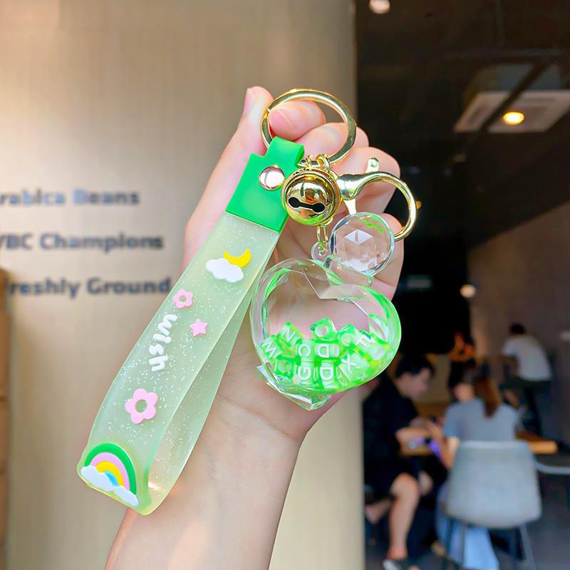 Exquisite Floating Sand Acrylic Perfume Bottle Keychain For Car Decor