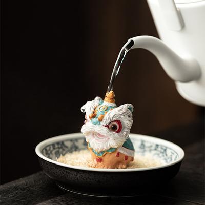 Animale da tè Leone Ornamento che cambia colore per la decorazione del tavolo da tè Design tradizionale di leone di buon auspicio Cultura della tendenza nazionale Accessorio per il tè