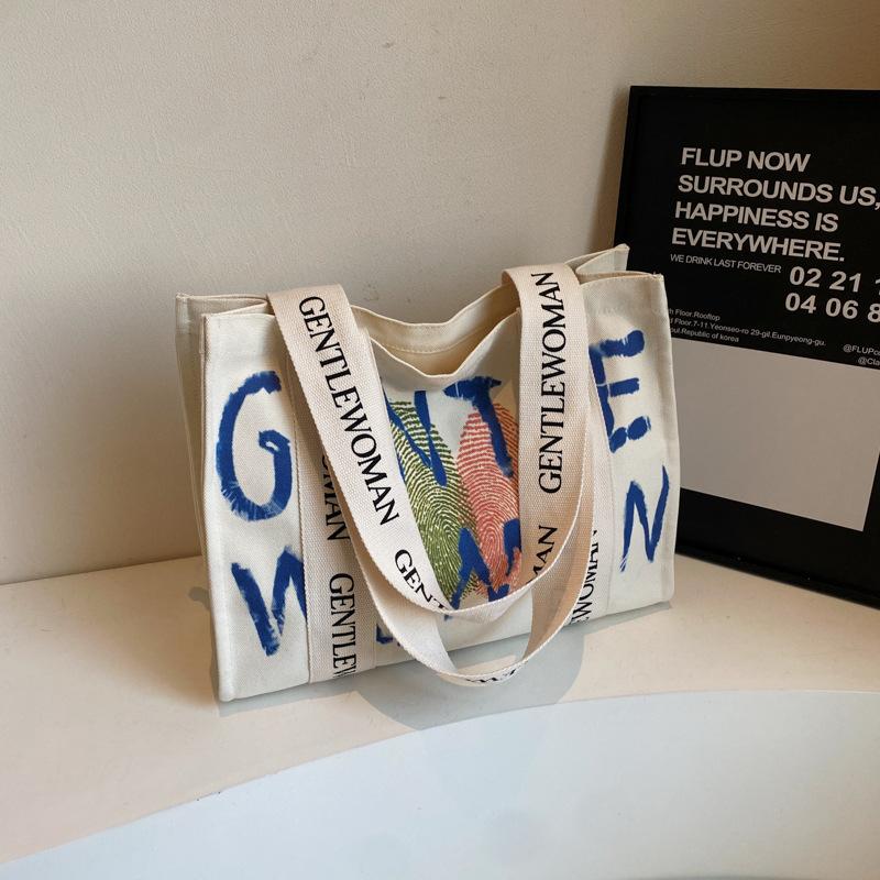 Commuter large-capacity alphabet canvas bag women's new fashion college student shoulder tote bag portable leisure bag