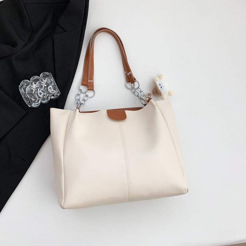 

Fashion simple shoulder bag women s 2024 winter new fashion personalized tote bag popular simple handbag women Without pendant коричневий