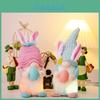 Colorful Light Up Easter Decor Featuring Adorable Doll With Bunny Ears And Eggs
