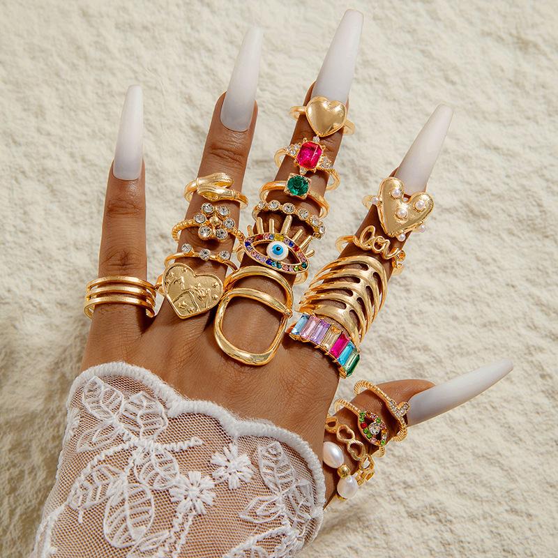 Vintage metal imitation emerald diamond ring set design sense love snake ring set women