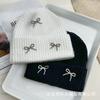 Autumn and winter new Xiaoxiangfeng steel ball bow wool hat versatile women's big head circumference ear protector knitted cold hat