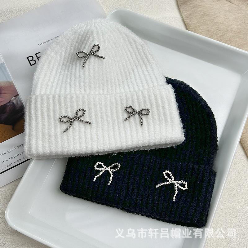 Autumn and winter new Xiaoxiangfeng steel ball bow wool hat versatile women's big head circumference ear protector knitted cold hat