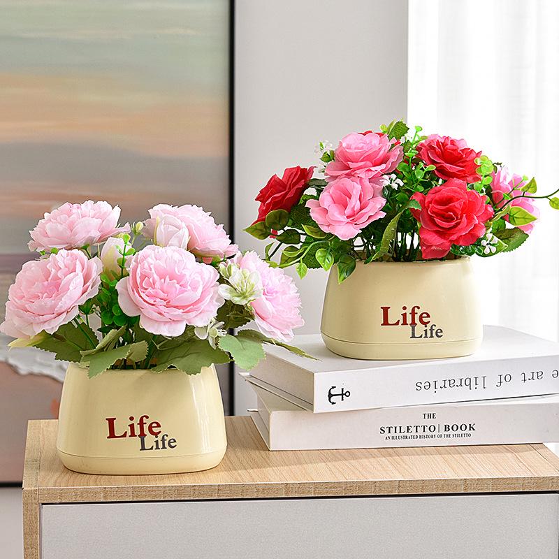 Living Room Decor: Artificial Sunflower and Green Plant Arrangements, Small Potted Plants, and Plastic Bouquets