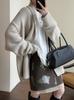 2026 Premium Cowhide Row Series Bowling Handbag, Large Capacity Commuting Shoulder Bag