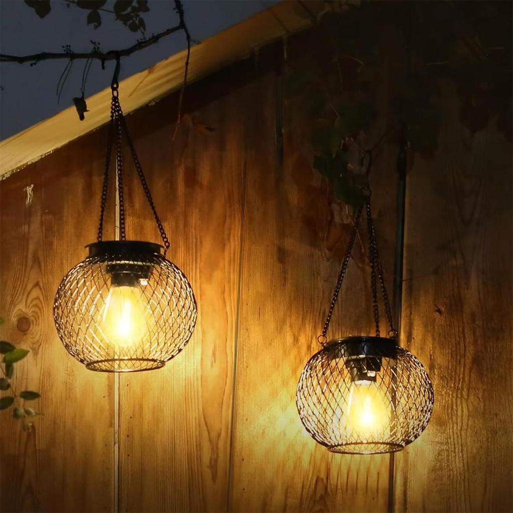 Solar Wrought Iron Lantern Light: Retro Mesh Pendant for Outdoor Garden, Courtyard, and Balcony Ambiance.