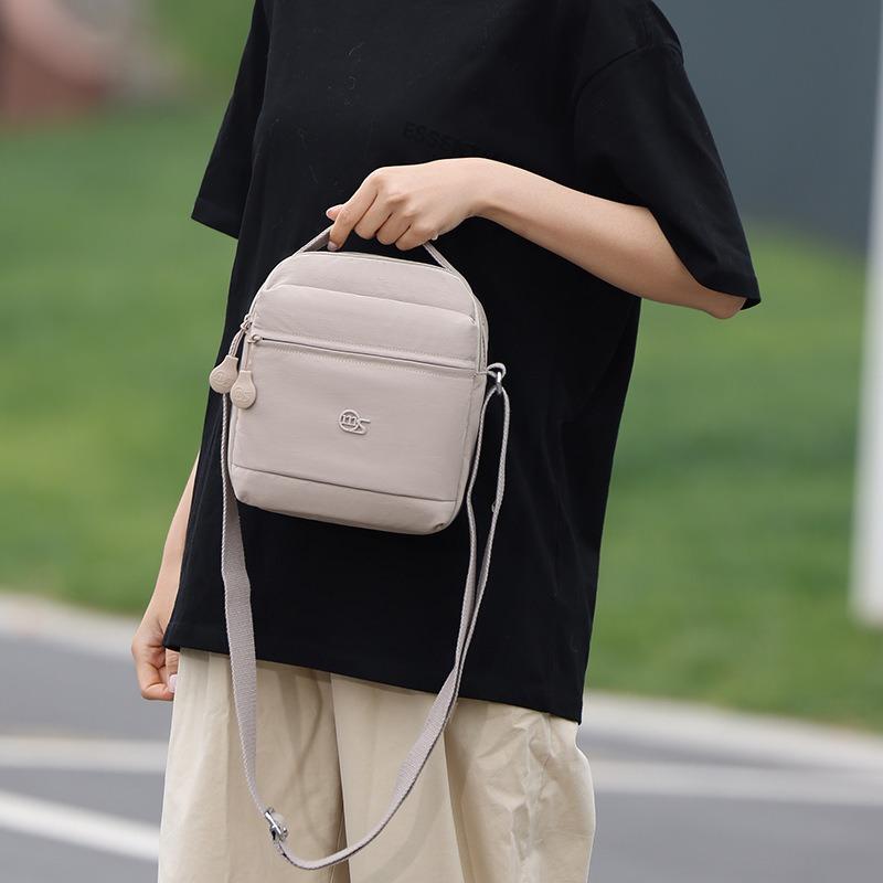 Premium bag women's summer new fashion messenger bag cloth bag portable small backpack