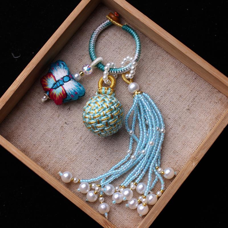 Number 16 Handmade Tassel Accessory with Ball Charm, Pearl, and Spinel Details.