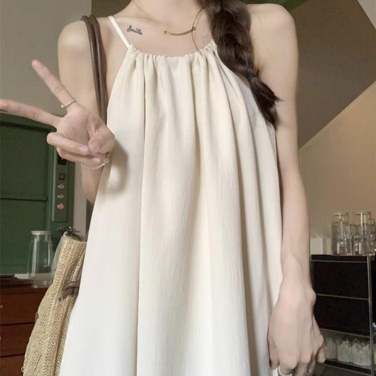 Summer new French gentle wind suspender dress women's design sense loose and thin seaside vacation beach dress