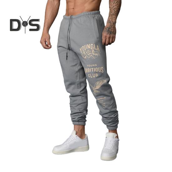 

Мужские спортивные брюки с эластичной талией на шнурке и карманами, принтованные джоггеры, свободные однотонные брюки с резинкой на щиколотке, спортивные штаны L серый