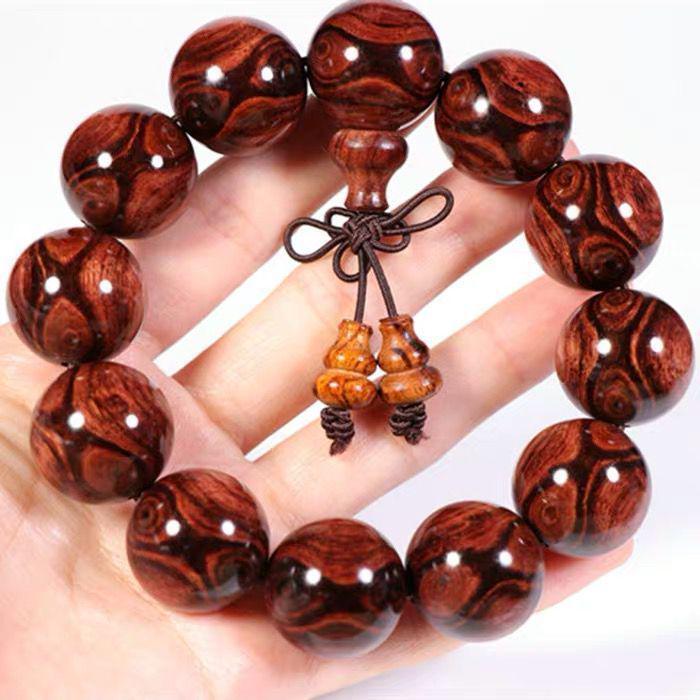 

Authentic Hainan Huanghuali Pearwood Buddhist Beads Bracelet - 108-Piece Ghost Face & Eye Design for Men & Women