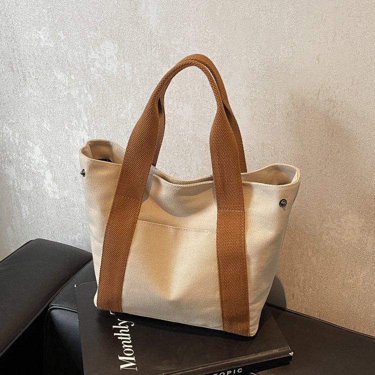 Canvas-Tasche Damen Herbst und Winter vielseitig 2025 neue Mode tragbare Damen-Tasche einfache Stofftasche Tragetasche