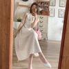 Beige polka dot jacquard sleeveless dress women's summer 2026 new French first love milk sweet A-shaped long skirt
