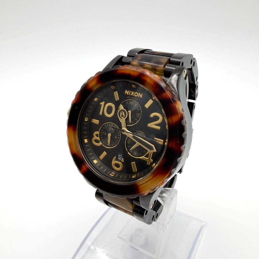 Used NIXON watch analog tortoiseshell model worn by Kiko Mizuhara