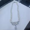Elegant Korean Style Freshwater Pearl Silver Water Drop Pendant Necklace for Women with Gentle Clavicle Chain and Oval Accent.