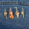1Pcs Symphony Orchestra Badge Funny Musical Instruments Enamel Brooches Trumpet Clarinet Saxophone Violin Shaped Golden Pins