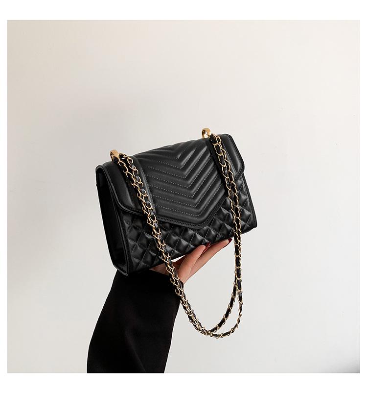 

Женская сумка-кроссбоди на цепочке с ромбовидным узором 2024 чёрный