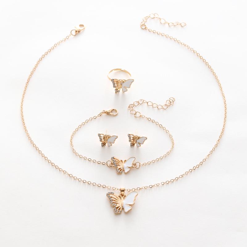 Elegancki Zestaw Biżuterii Motylkowej: Naszyjnik, Bransoletka, Pierścionek, Kolczyki