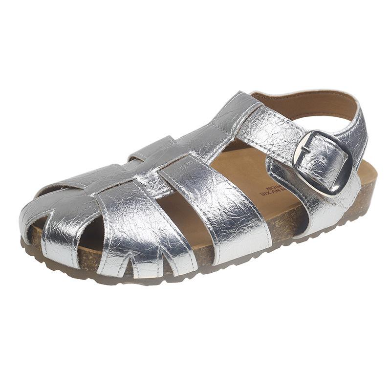 Gewebter Feenwind hohler Beutel Kopf Rock Sandalen Damen Sommer mit 2025 neuen flachbodigen vielseitigen lässigen Schweinekäfigschuhen