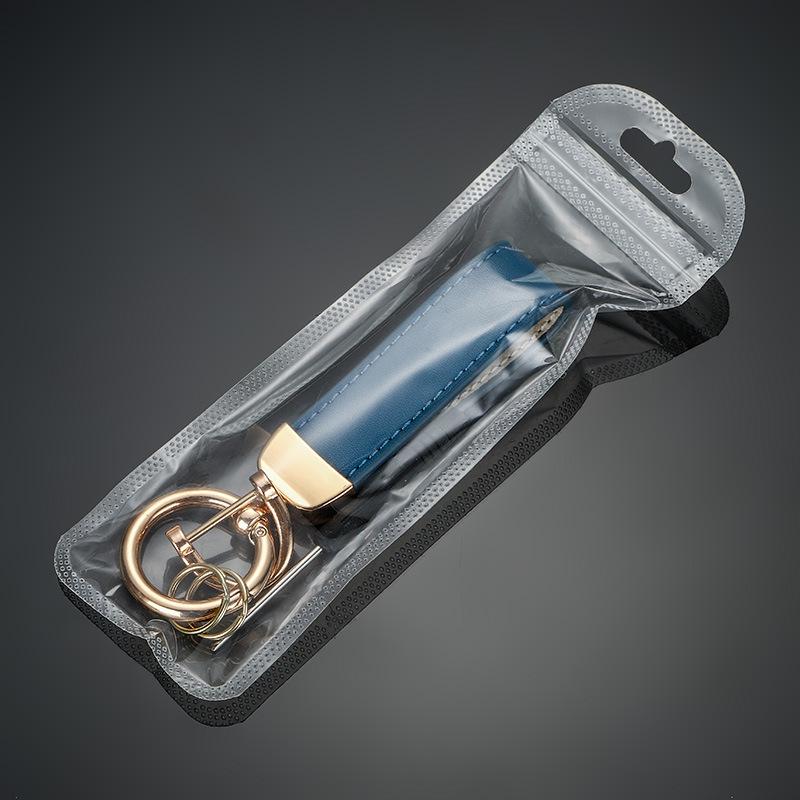 

Металлический брелок-фигурка с цветовыми блоками: Стильный кожаный аксессуар для мужчин и женщин для дома, мотоцикла и автомобиля.