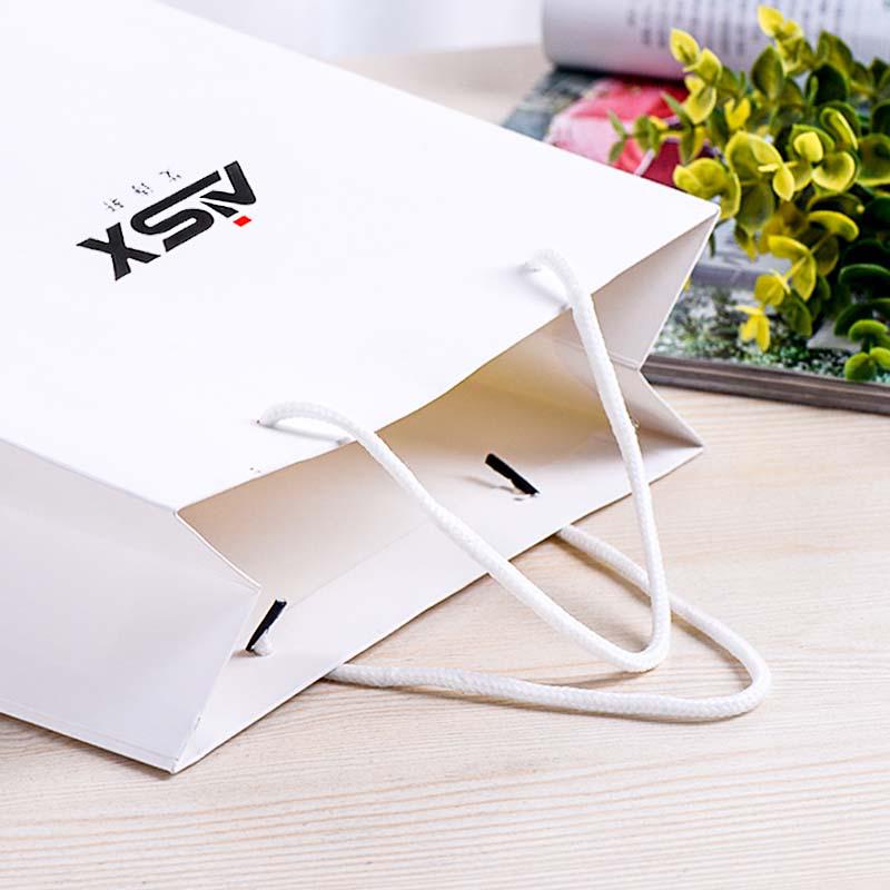 Paper bag brand perfume special large, medium and small diverse white gift bag small gift bag