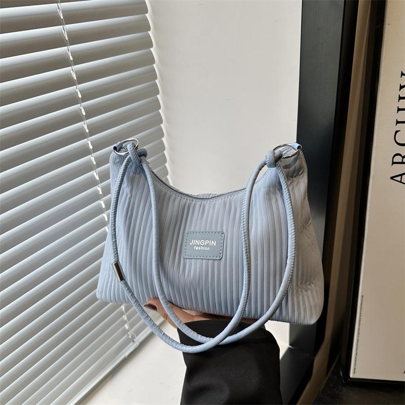 2025 Casual Large-capacity Indentation Stripes Fresh New Summer Foreign Style Commuting Solid Color Shoulder Underarm Handbag