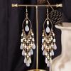 European, American Bohemian water drop fringed earrings, high-end retro minority style earrings, personalized long earrings.