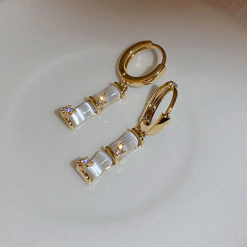 2023 Elegant Retro Bamboo Hoop Earrings for Women - Niche Chinese Design.