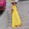 Seaside Vacation Sexy Backless Suspender Dress Women's Summer New Loose A-word Skirt Gentle Yellow Long Skirt