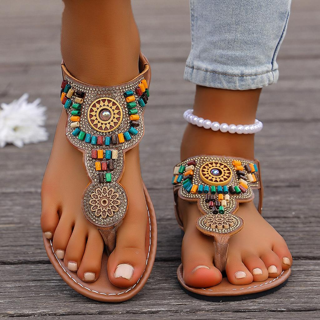 Sandales Plates de Style Bohème pour Femmes Sandales de Gladiateur à Bout Clip Femme Rétro Été Décontracté Chaussures de Plage Antidérapantes Tongs