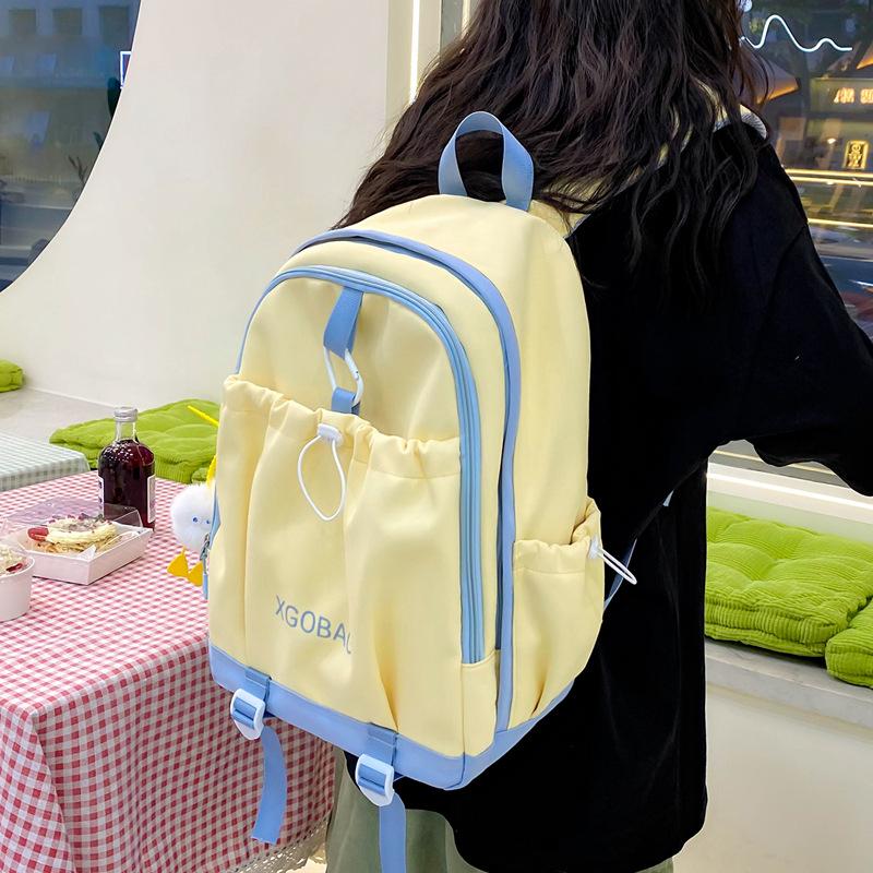 Backpack new high-value large-capacity junior high school student schoolbag women's fashion sports leisure backpack