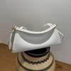Französisches Nischendesign minimalistischer Stil Rindsleder Schulter Achseltasche Pendeln einfach Mode vielseitig Damenmode Baguette-Tasche