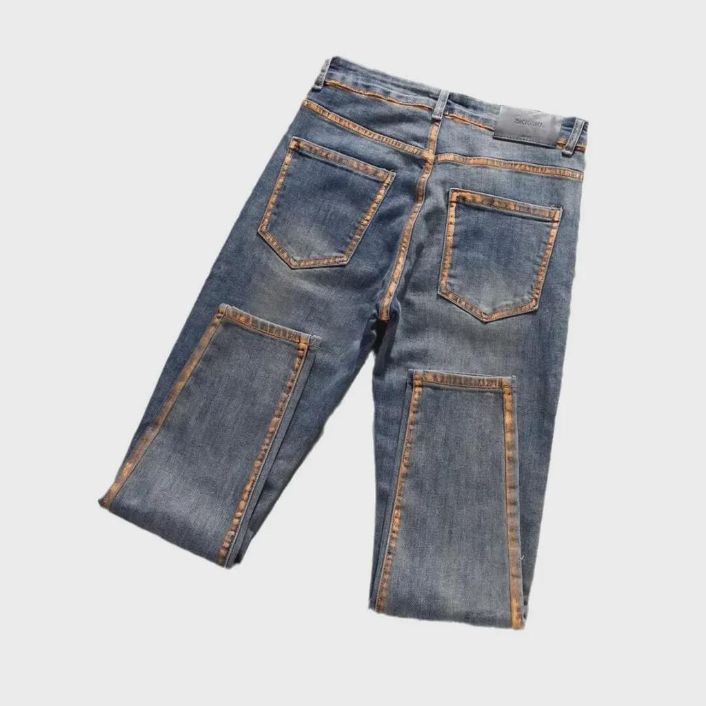 Leichte Luxus-Slim-Fit-Jeans im koreanischen Stil für Herren mit Farbdruck – trendige Freizeithose mit dünnem Design.