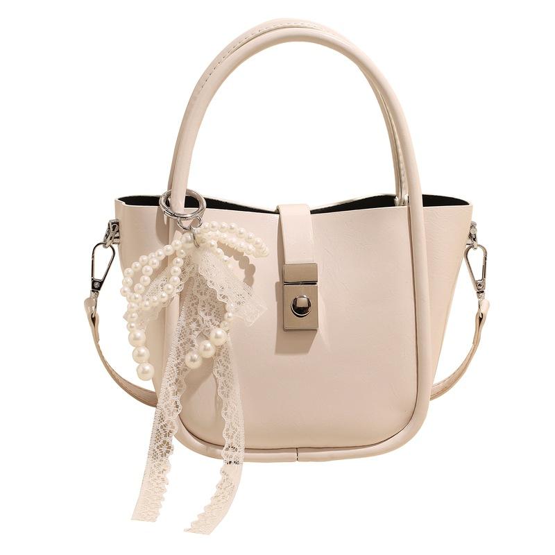 Spring and Summer New Casual Simple High-end Oil Wax Leather Portable Bucket Bag Korean Version Niche Design Solid Color Messenger Bag