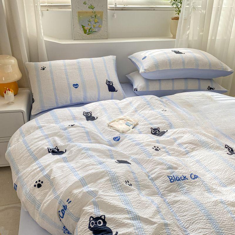 Nordická jednoduchá pruhovaná malá černá kočka praná bavlna čtyřdílná sada kreslený povlak na přikrývku prostěradlo studentská kolej třídílná sada