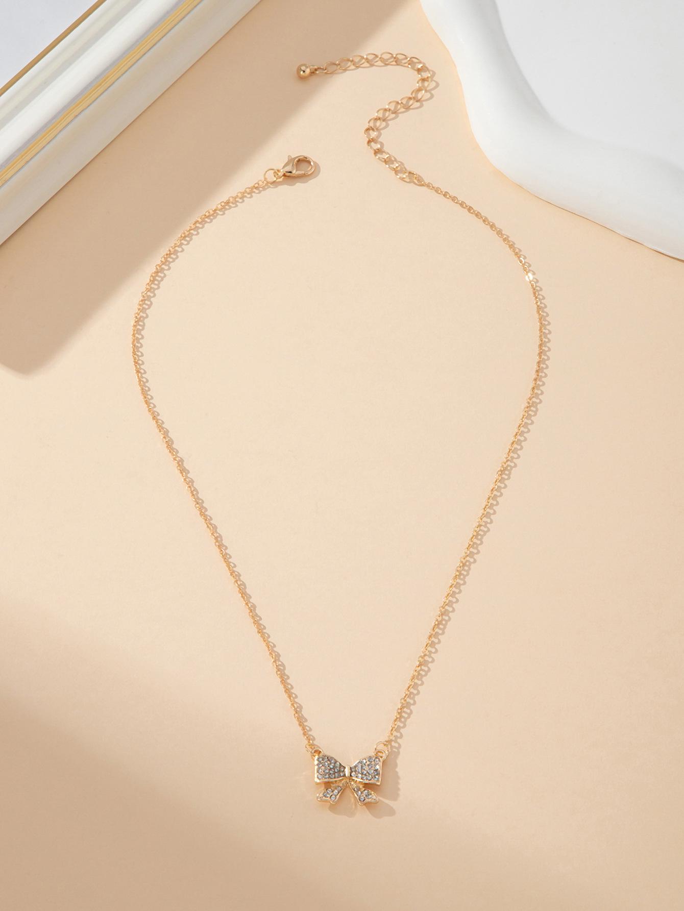 Elegant Rhinestone Bow Pendant Necklace for Women | Trendy, Simple, and Versatile Jewelry золотой