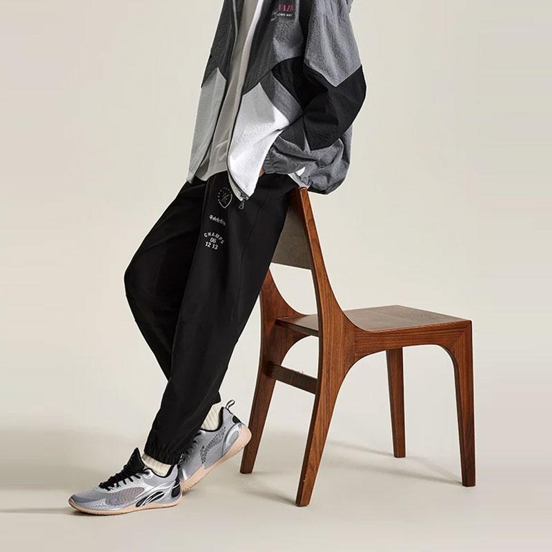 Li Ning Wade Series Solid Color Reflective Ice Feel Sun Protection Knitted Sports Pants Men Bottoms Black AKYU017-1