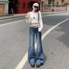 Retro blue low-rise slightly pulled jeans women's year autumn and winter new slim-fitting wide-leg slim-looking flared pants without sticking to the