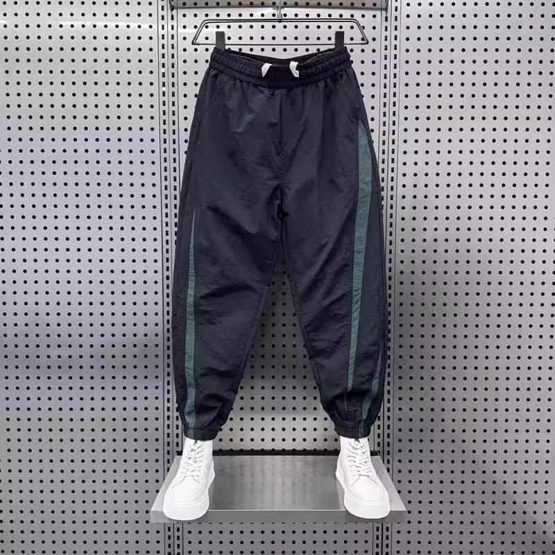 Men's Stylish Ice Silk Quick-Dry Harem Pants - Spliced, Fashionable, Versatile, and Trendy for Spring and Summer.