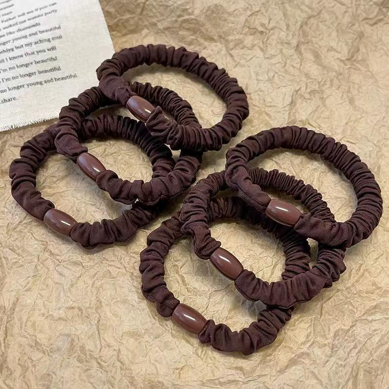 Versatile Black Elastic Hair Tie with Durable Leather Case