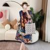 Temperament Vacation Style Printed Loose Fitting Dress for Women Spring and Autumn New Pleated Quarter Sleeved Round Neck Skirt