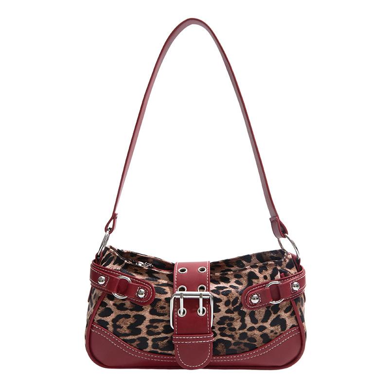 Boucle de ceinture rétro imprimé léopard sac à bandoulière tempérament nouveau mode printemps et été rivet grande capacité décontracté sac d'aisselle