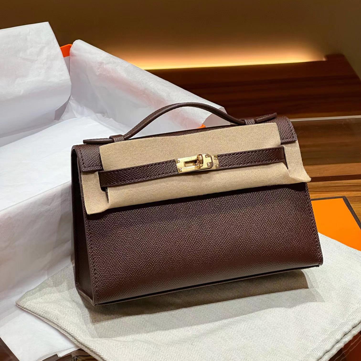 

Оптовая продажа нового поколения простой маленькой квадратной сумки через плечо, с косым ремнем, портативной, из первого слоя коровьей кожи, женской сумки, с отстрочкой 22x7x13cm