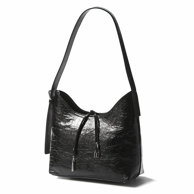 

Сумка-ведро из натуральной кожи для женщин. Модная и стильная сумка-ведро для поездок на работу. чёрный