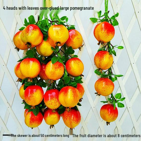 

Декор ресторану в стилі фермерського будинку: Штучна фруктова лоза з персиками, яблуками та бананами.