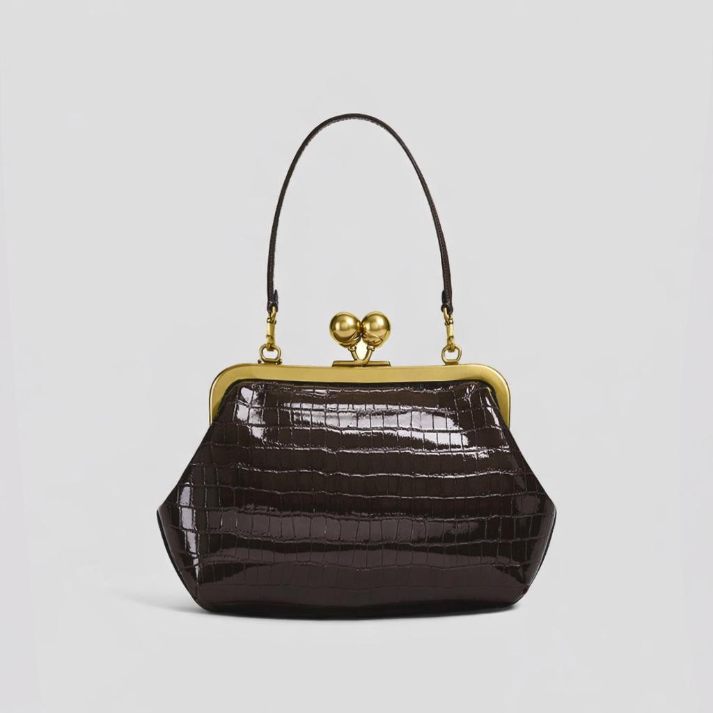 Vintage small kiss lock clip clutch