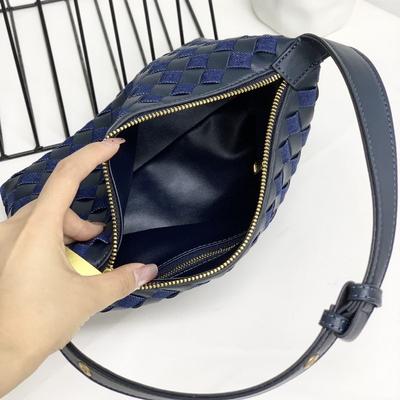2025 New Leather Women's Bag Fashion Retro Weaving Underarm Handheld Lunch Box Bag Cross Border