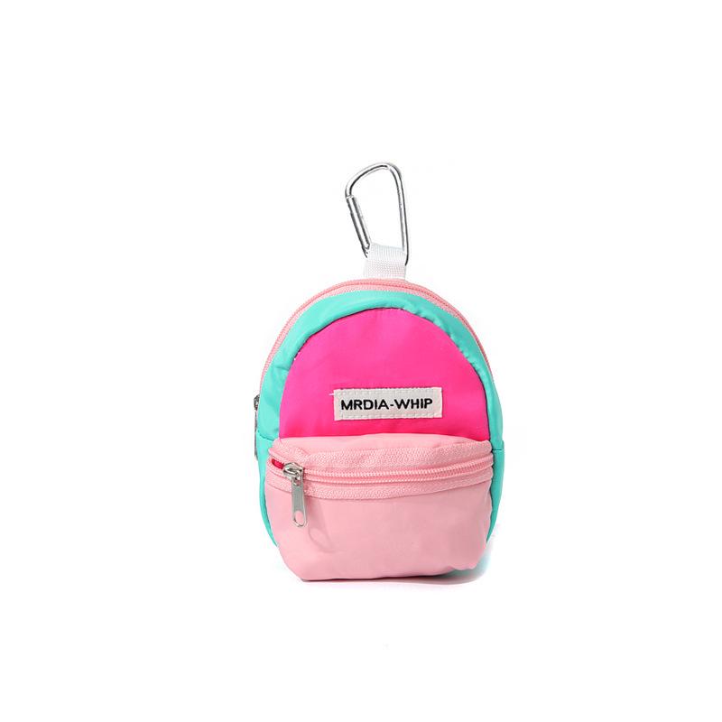 Mini Portable Candy Color Backpack Pendant: Mobile Phone, Earphone, Coin, and Key Storage Bag.