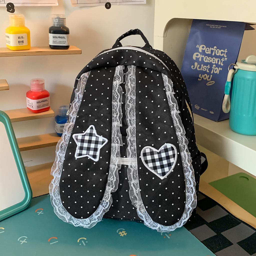 Schoolbag Korean simple foreign style polka dot love rabbit ear backpack 1011 summer new commuter student backpack